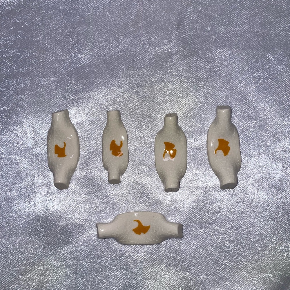 Set of five chopstick holder. Ceramic